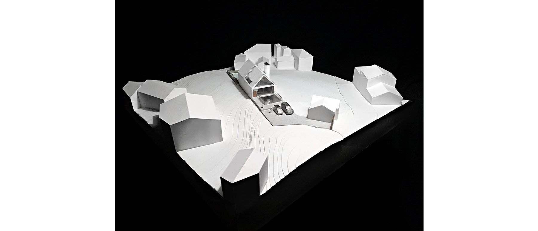 House 148: new build house on a narrow sloping site
