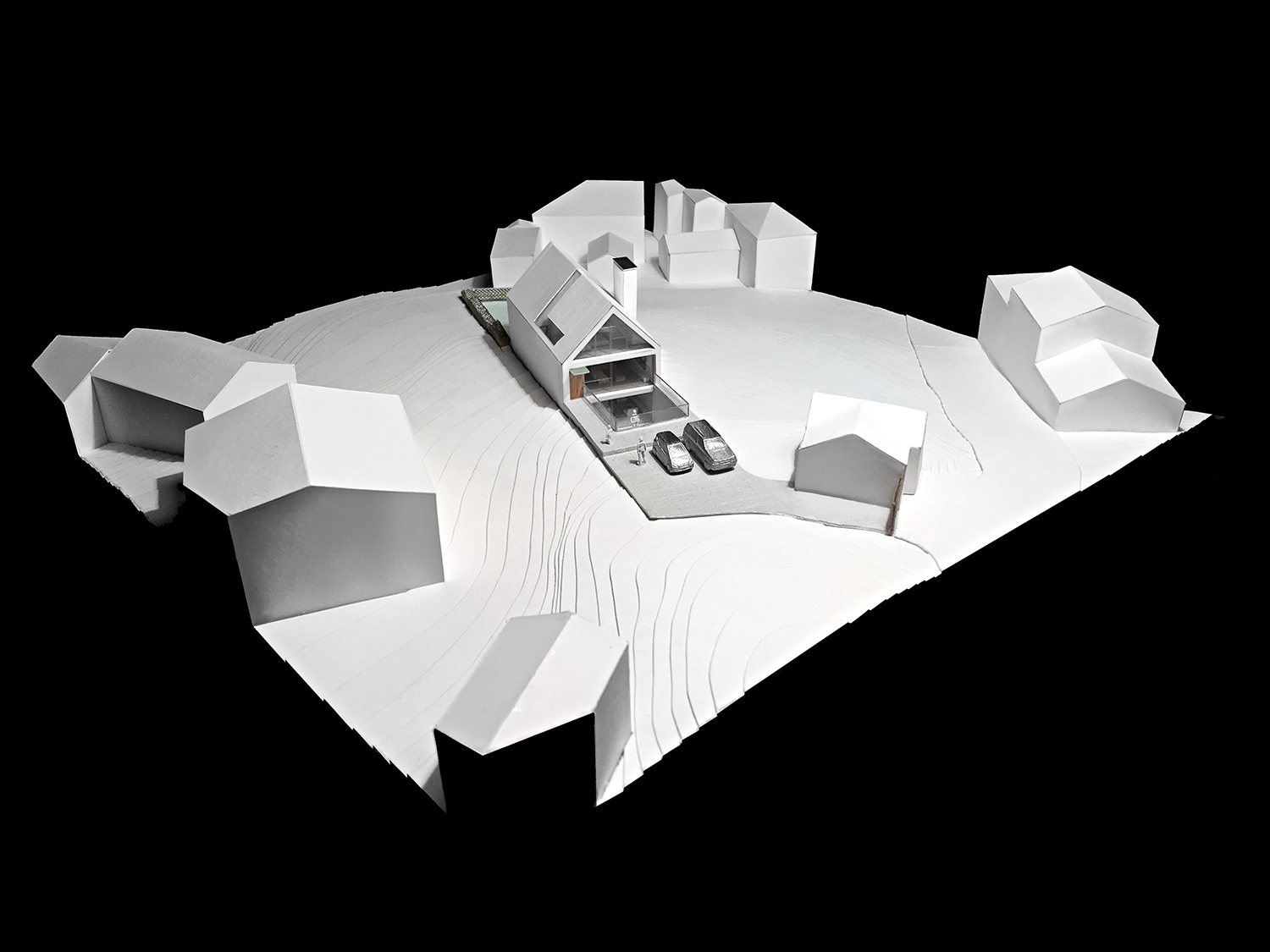 House 148: new build house on a narrow sloping site