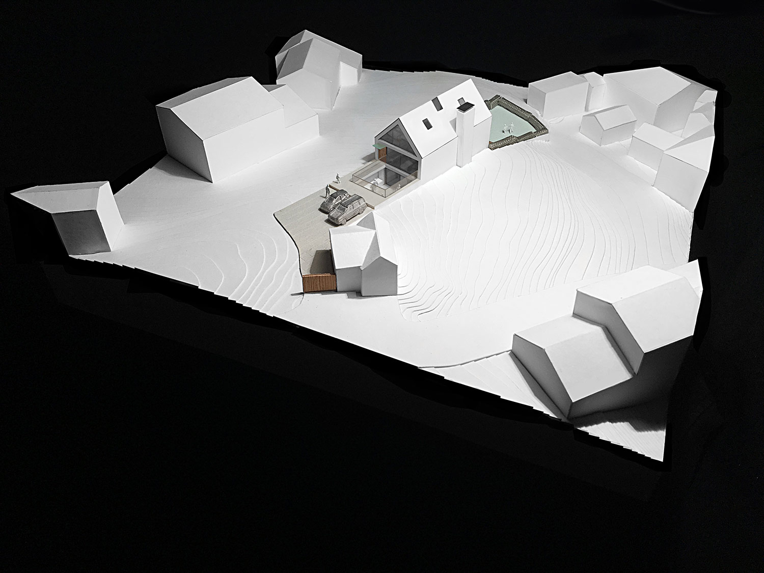 House 148: new build house on a narrow sloping site