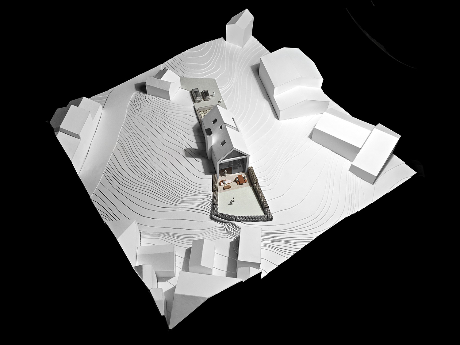 House 148: new build house on a narrow sloping site