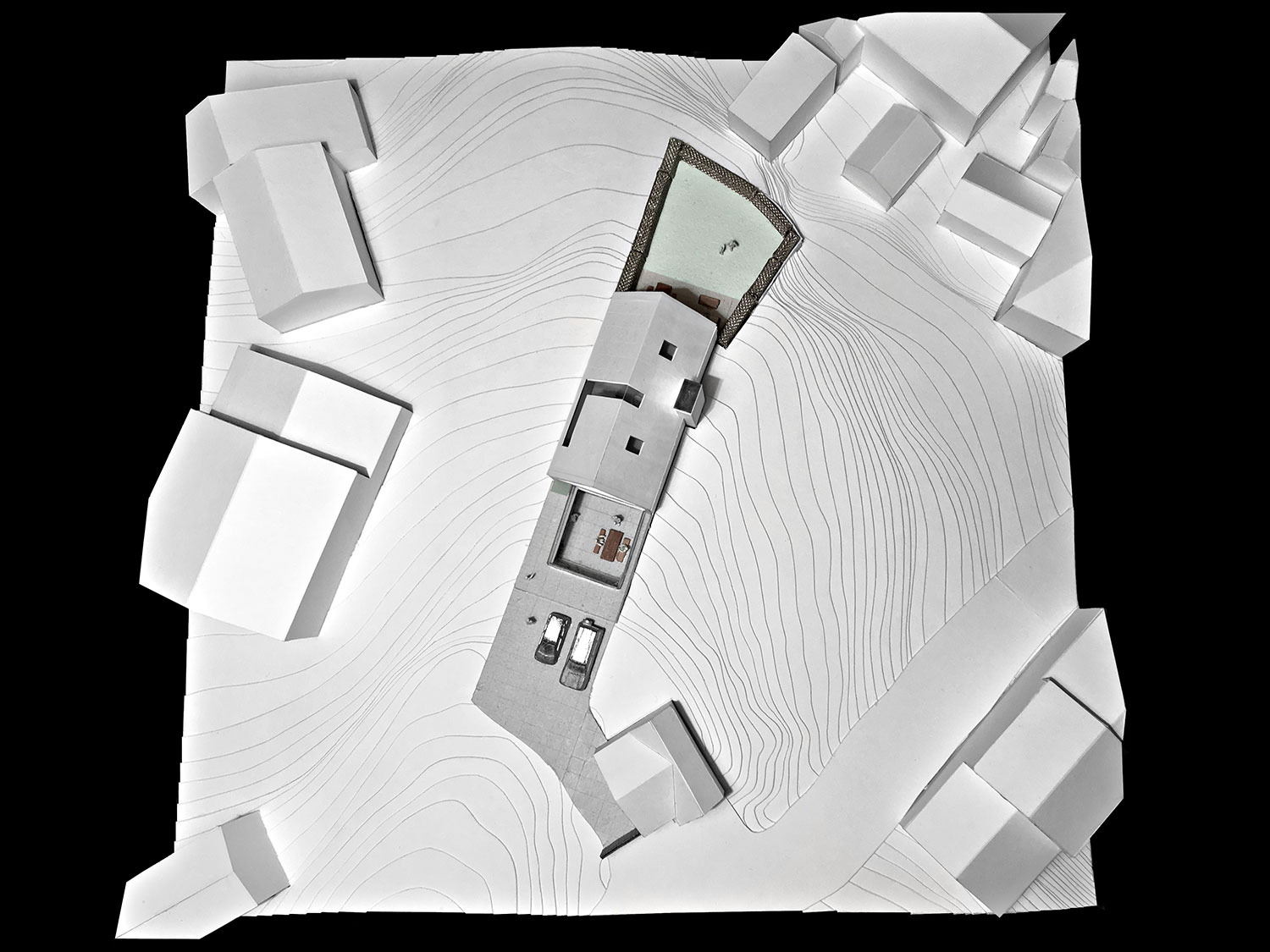 House 148: new build house on a narrow sloping site