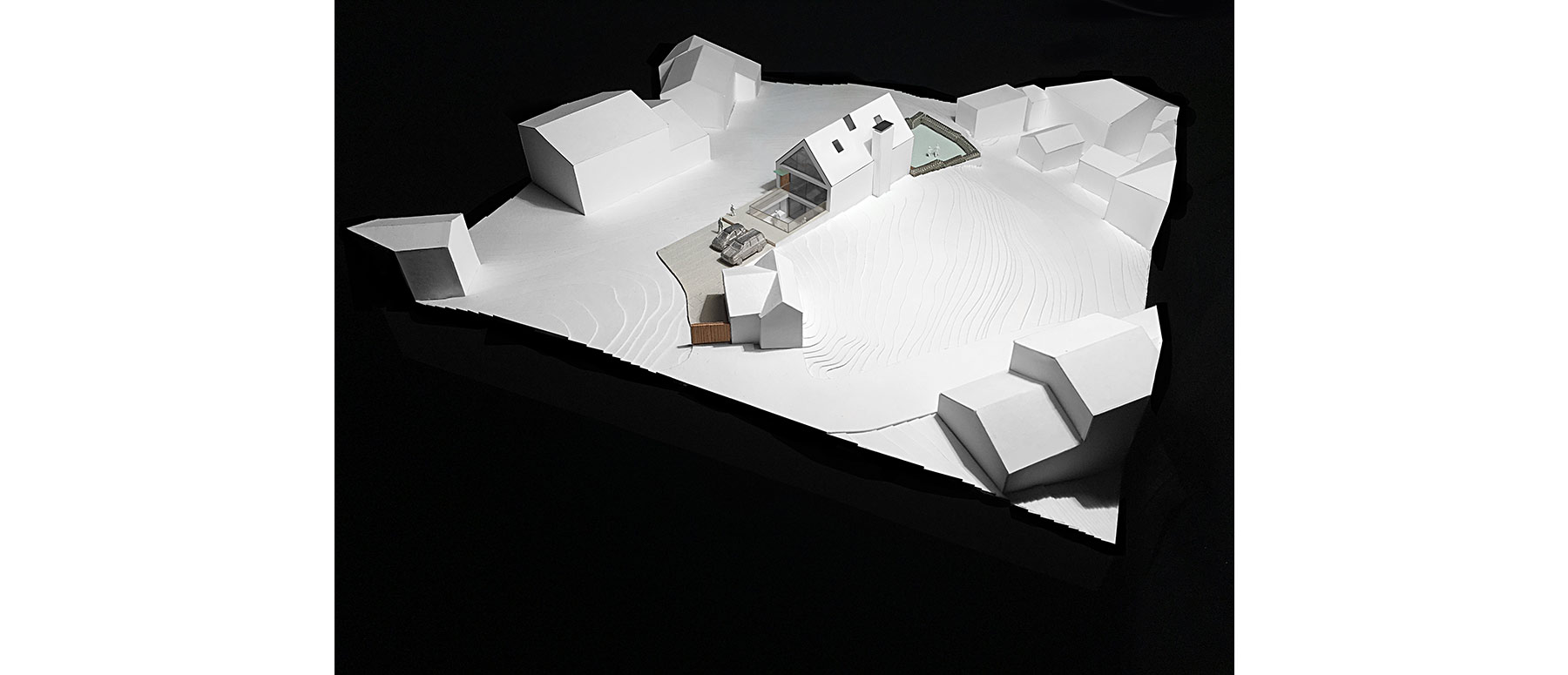 House 148: new build house on a narrow sloping site