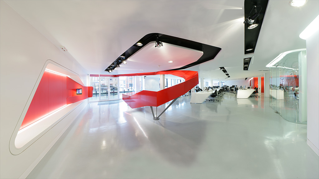 Office interior with a sweeping red feature, designed by Andrew Wallace Architects